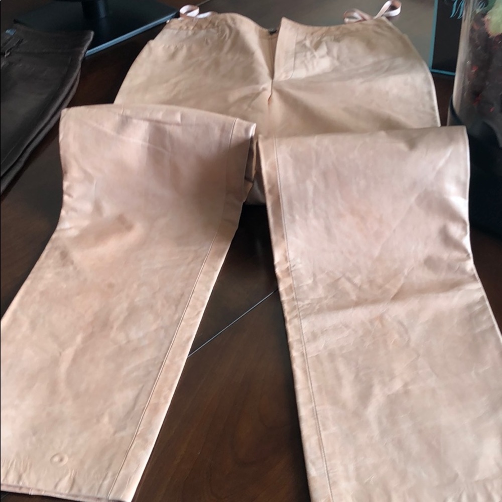 Peach colored leather pants